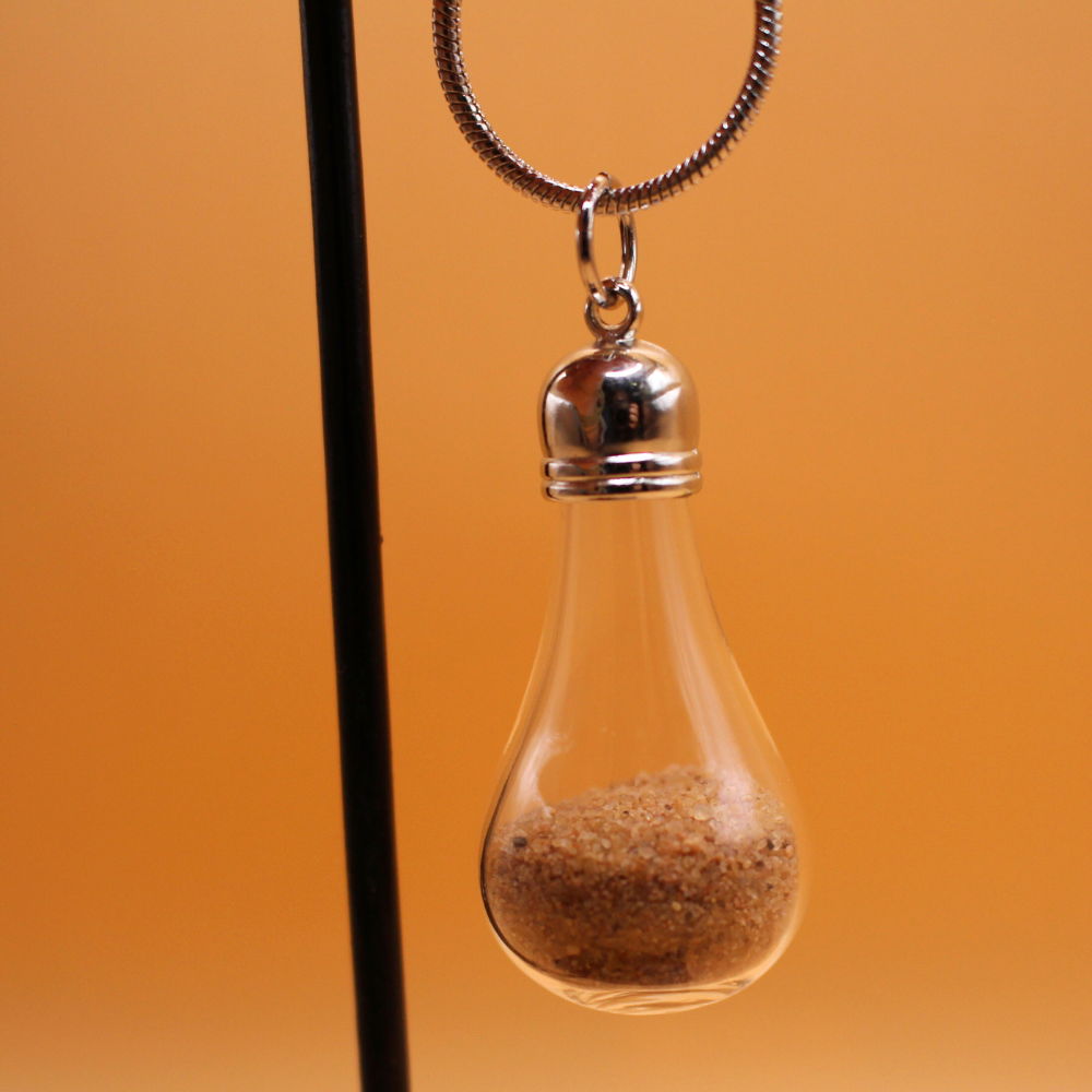 Long necklace filled with Sahara sand from Niger