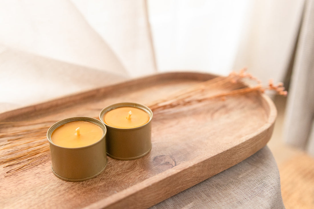 2x 100% beeswax candles in recycled salsa tin (gold colored).