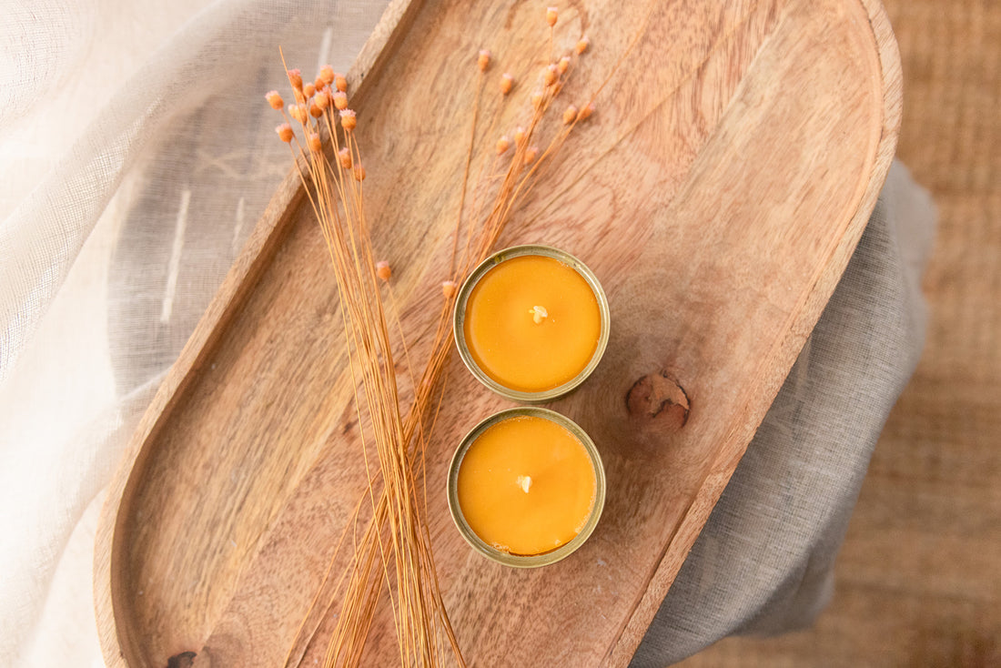 2x 100% beeswax candles in recycled salsa tin (gold colored).